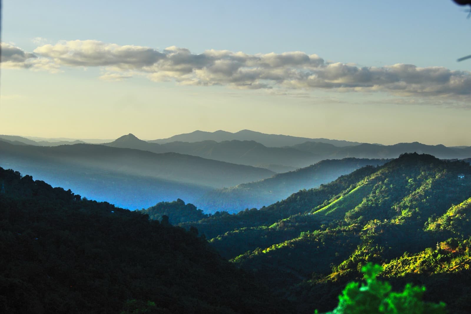 Forested hills catching the first light in Hlimen Damveng